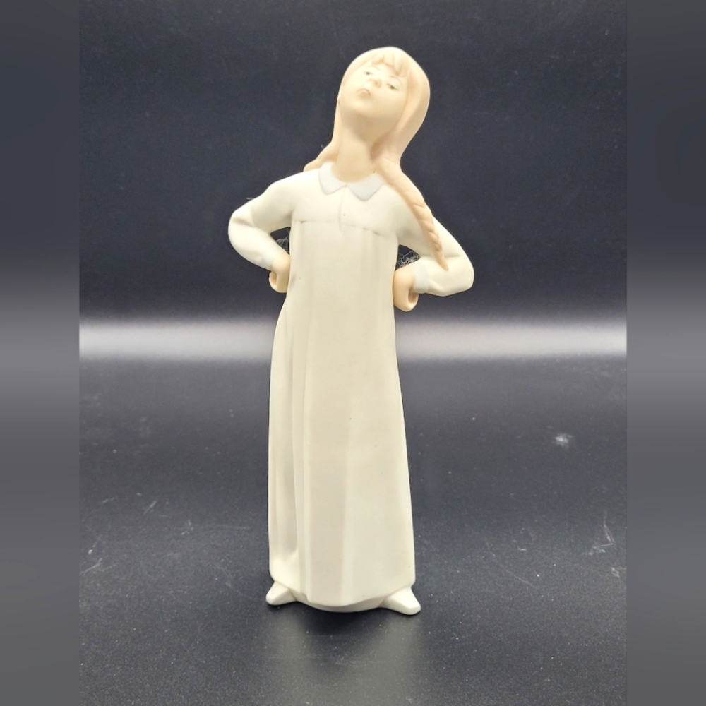 Lladro Skeptical Young Girl In Night Gown Bisque Matte Finish